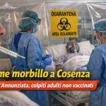 Reparto ospedaliero con paziente isolato e personale sanitario dopo i casi di morbillo all’Annunziata di Cosenza