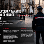 Carabiniere di spalle davanti alla scena del crimine nel centro storico di Taranto dopo l’omicidio del bracciante Bakari Sako